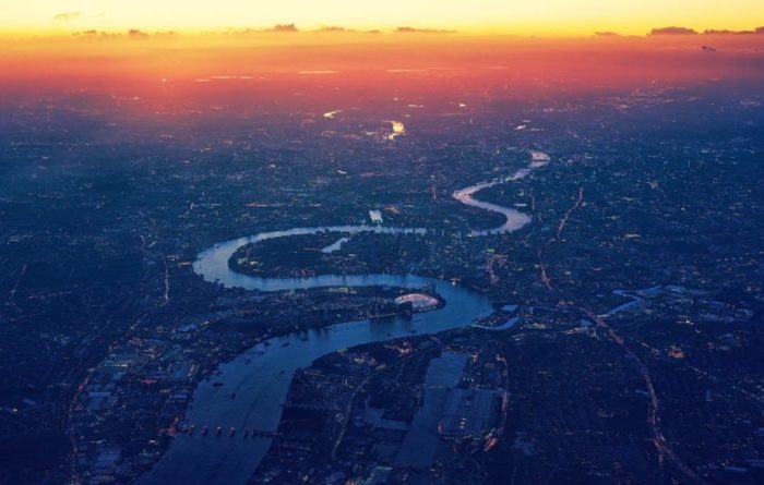 Aerial view of the River Thames at sunset.